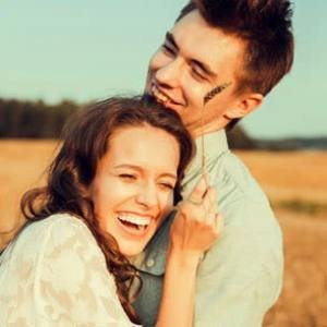 Happy couple representing positive relationship experience from customers